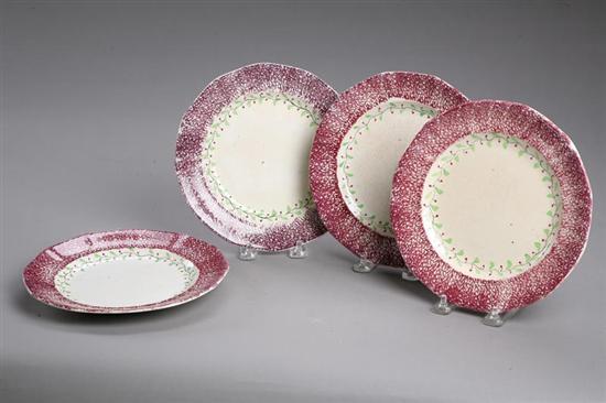 Appraisal: FOUR PURPLE SPATTERWARE PLATES English st half- th century Paneled