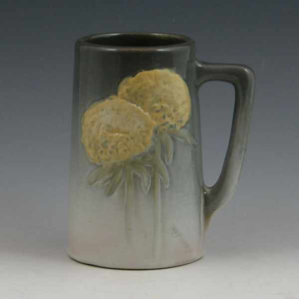 Appraisal: Weller Etna mug with yellow mums Marked WELLER Mint with