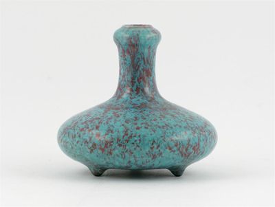 Appraisal: A Chinese robin's egg glazed small vase raised on three