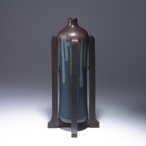 Appraisal: Rare OWENS Mission tall bottle-shaped vase in original oak stand