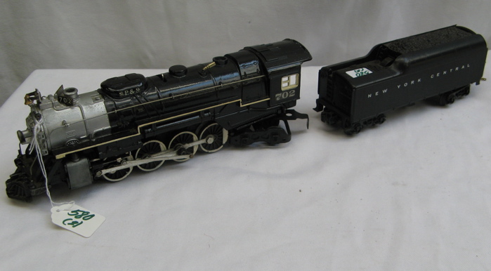 Appraisal: LIONEL STEAM LOCOMOTIVE AND COAL CAR the pre-WWII locomotive model