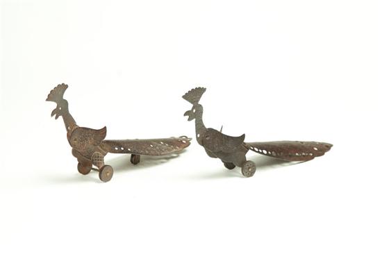 Appraisal: TWO PULL TOYS Probably th century sheet iron Similar peacocks