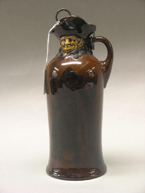 Appraisal: A Royal Doulton Kingsware liquor flask in the form of