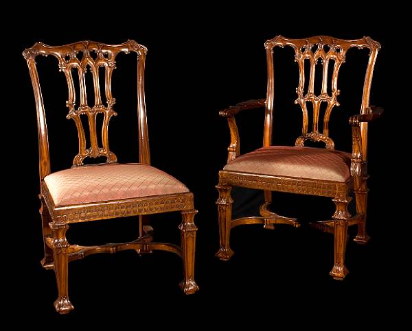 Appraisal: A set of eight Chippendale style walnut dining chairs Comprising