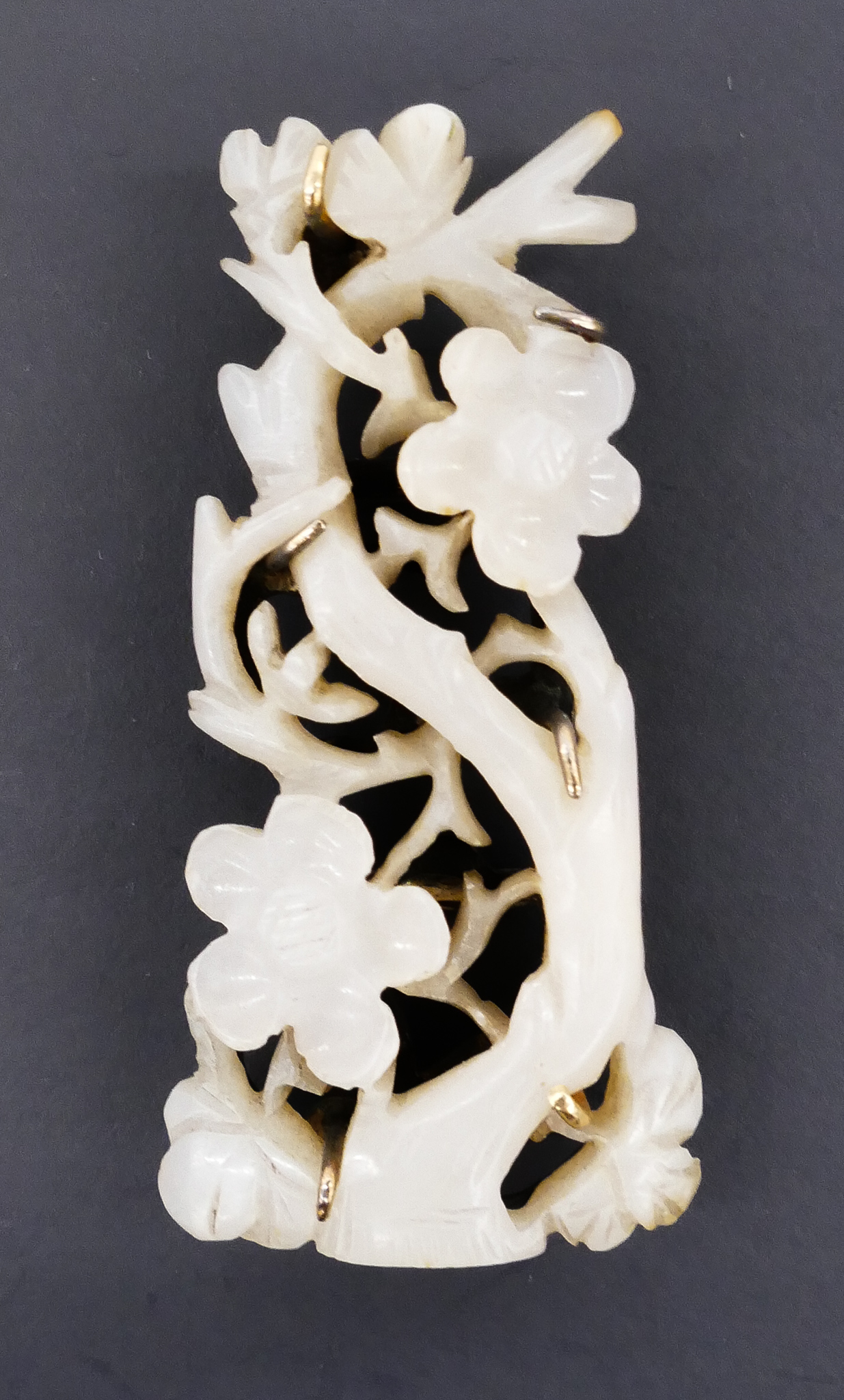 Appraisal: Chinese Qing Jade Prunus Plaque Slide '' Intricately carved pale