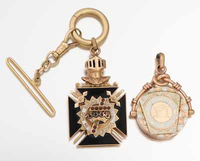 Appraisal: Two Masonic Pendants American th Century Containing a k yellow