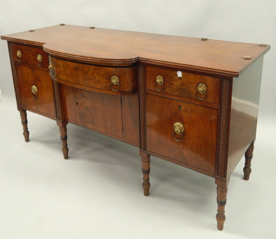 Appraisal: An early thC mahogany sideboard the top with a reeded