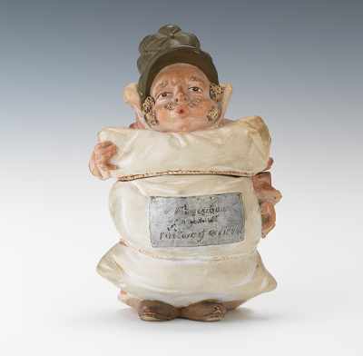 Appraisal: Comical Pottery Tobacco Jar Gentleman with Pillow Pottery tobacco jar