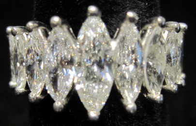 Appraisal: Platinum eternity bandTwenty-five graduated marquise cut diamonds Largest approximately carats