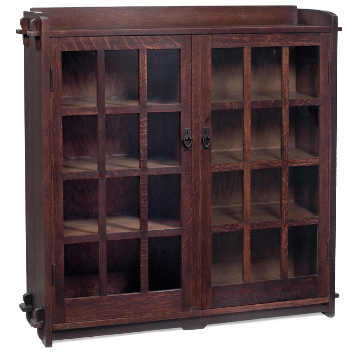 Appraisal: Gustav Stickley bookcase two-door form with twelve panes of glass