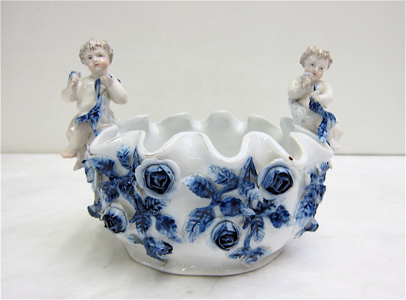 Appraisal: GERMAN PORCELAIN FIGURAL BOWL blue and white with pair of