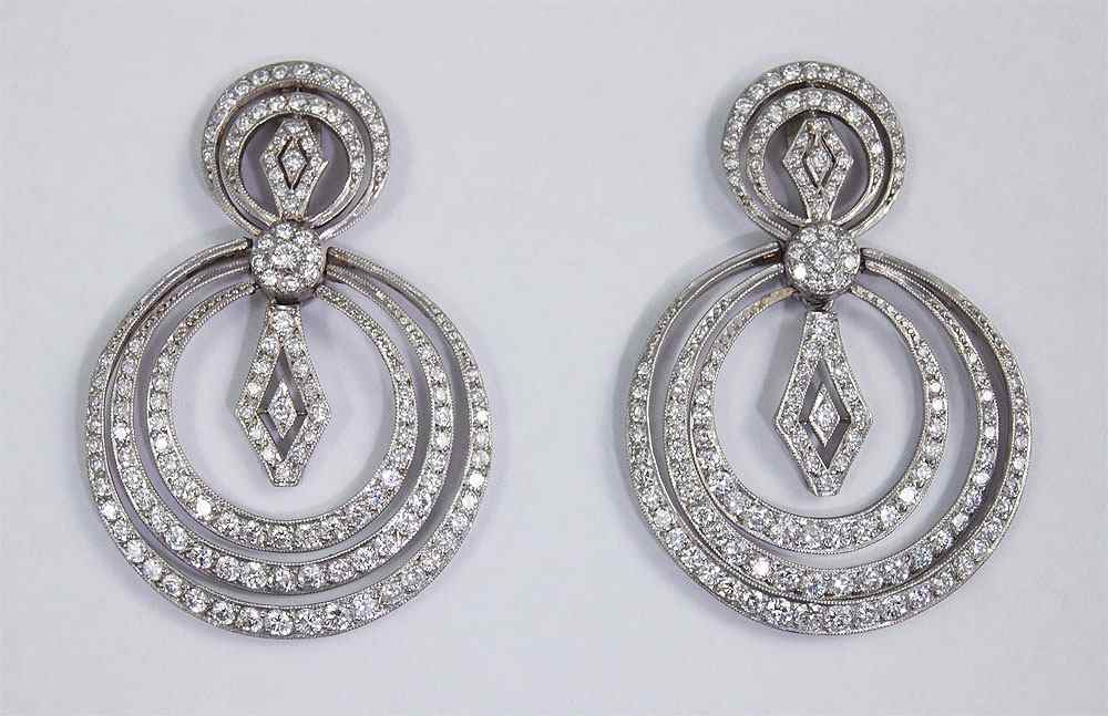 Appraisal: FRENCH RINGS OF PLATINUM AND DIAMONDS EARRINGS Platinum earrings contain