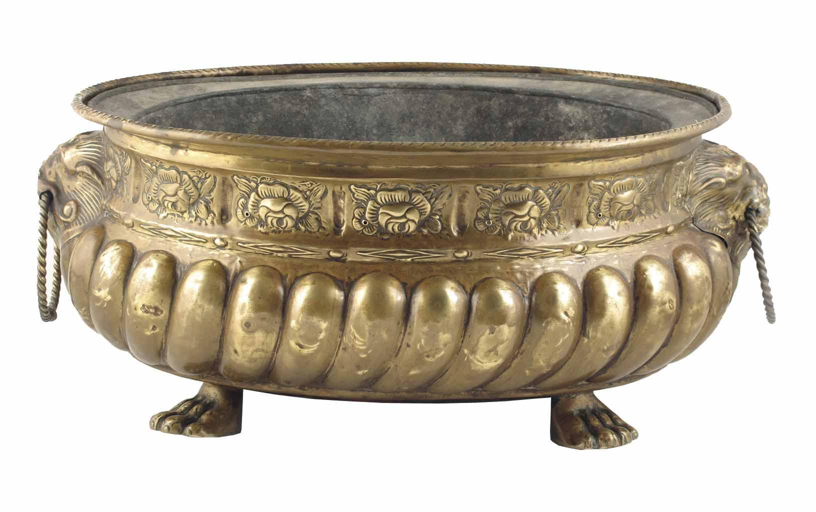 Appraisal: An embossed brass oval jardini re