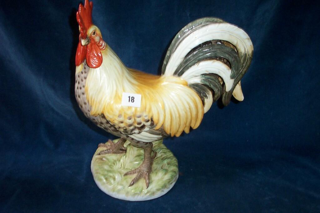 Appraisal: A large continental ceramic model of a cockerel with naturalistic