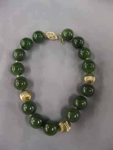 Appraisal: Jade k Gold Bracelet fine jade mm beads with a