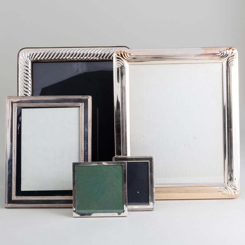 Appraisal: Group of Three Silver Picture Frames Comprising Two small English