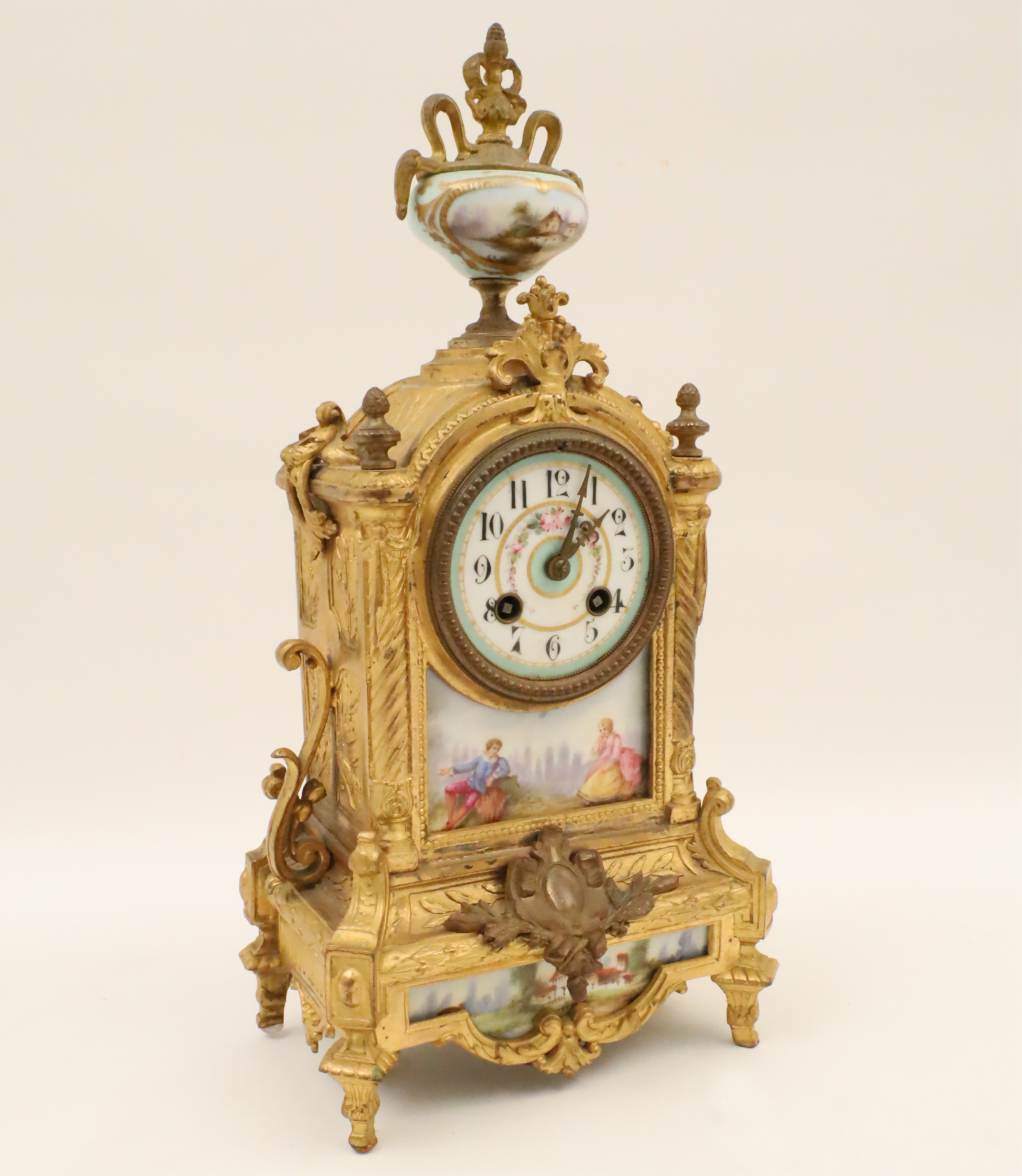 Appraisal: FRENCH LOUIS XVI STYLE BRONZE AND PORCELAIN CLOCK French Louis