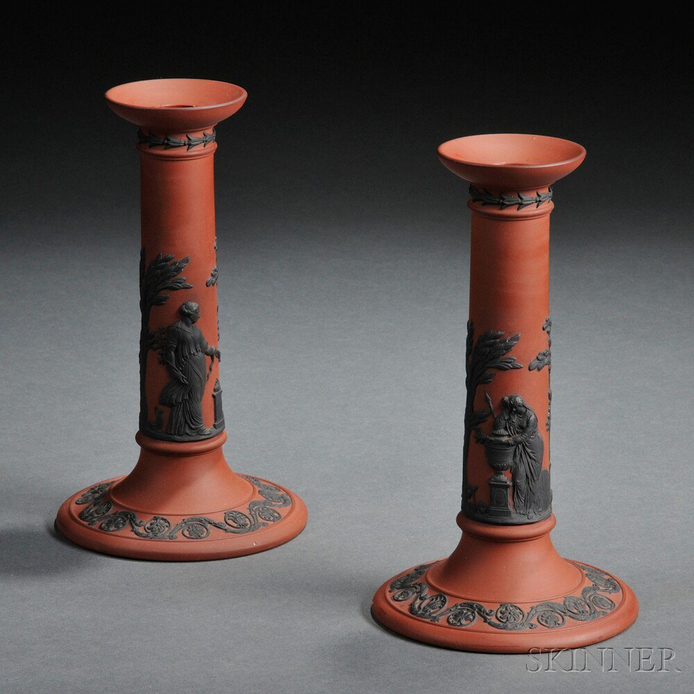 Appraisal: Pair of Wedgwood Rosso Antico Candlesticks England early th century