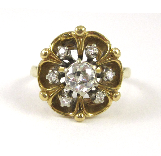 Appraisal: DIAMOND AND FOURTEEN KARAT GOLD RING with six round-cut diamonds