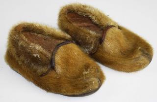 Appraisal: Pair seal skin and leather eskimo child's moccasins l Pair