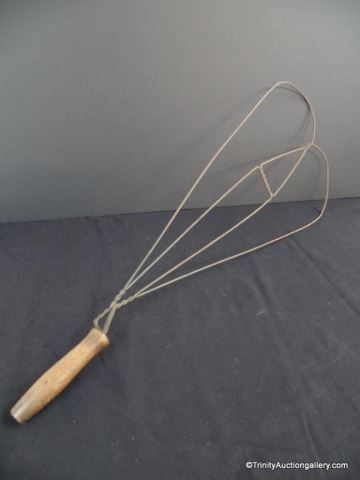 Appraisal: Bent Iron Wood Handle Rug Blanket Beater This one is