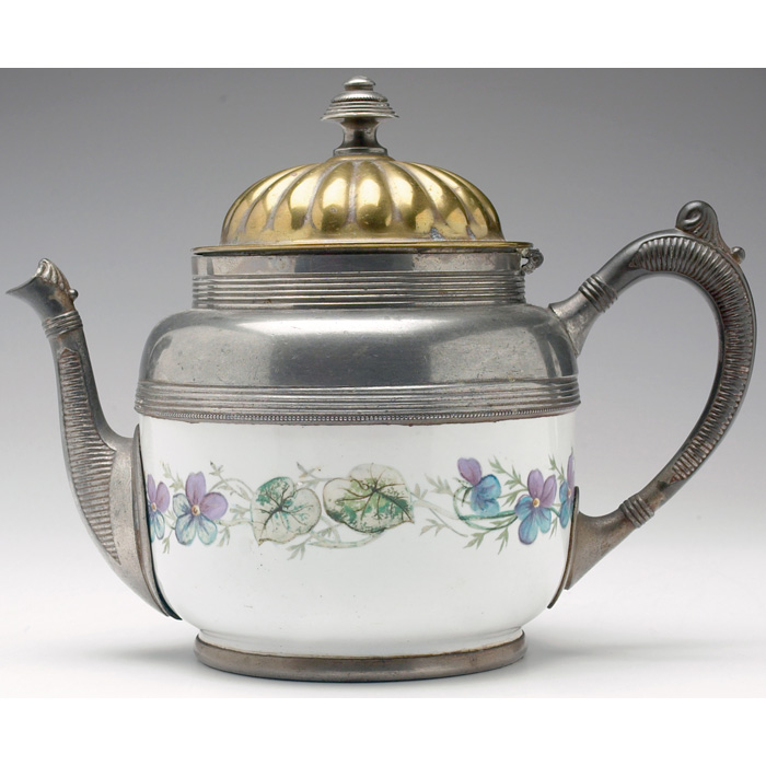 Appraisal: Victorian teapot porcelain body decorated with violets and ivy brass