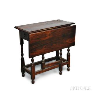 Appraisal: Georgian Walnut One-drawer Tuckaway Table thumbmolded top and straight single-drawer