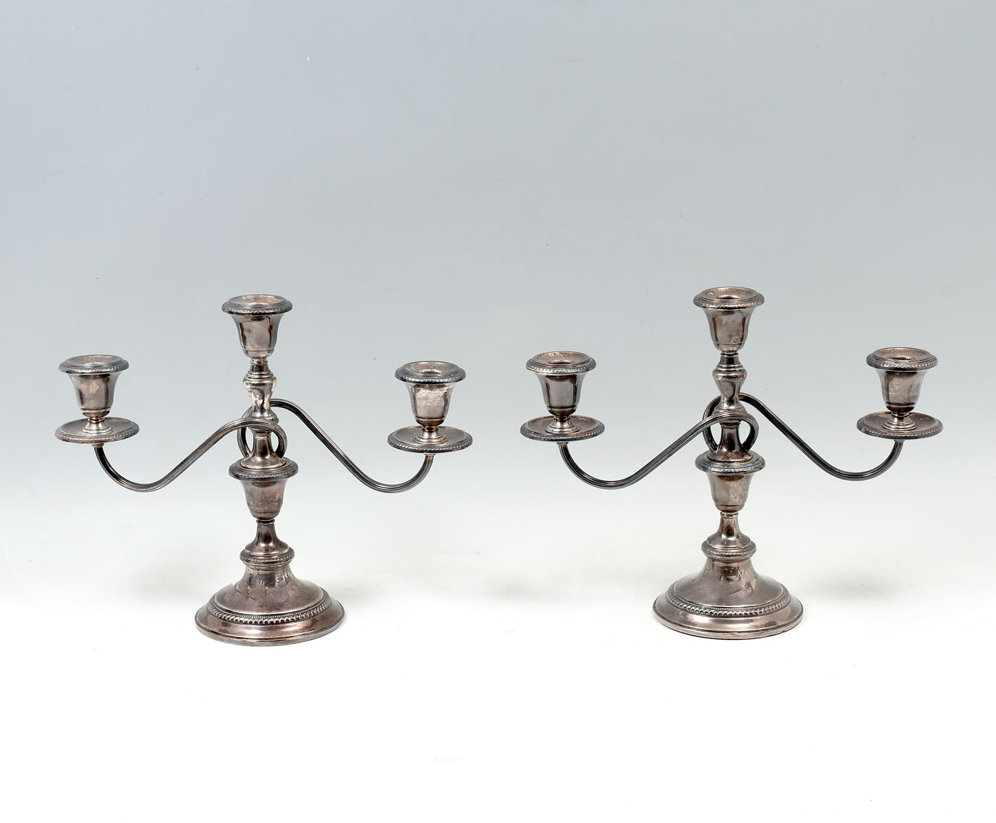 Appraisal: PAIR OF FRANK WHITING STERLING LIGHT CANDLESTICKS Pair of weighted