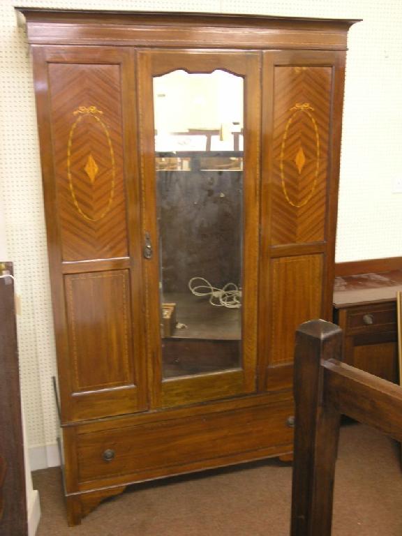 Appraisal: An Edwardian inlaid mahogany bedroom suite wardrobe with three-quarter length