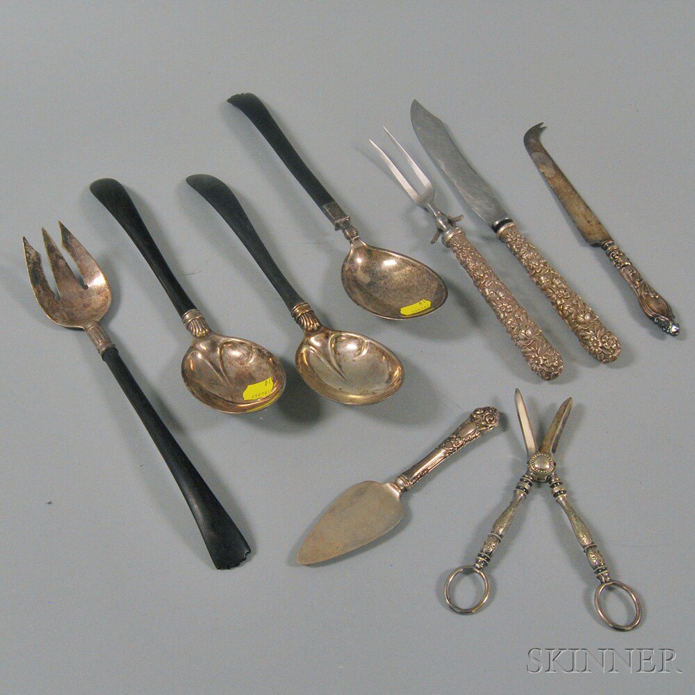 Appraisal: Nine Flatware Serving Items four Gorham wood-handled serving spoons and