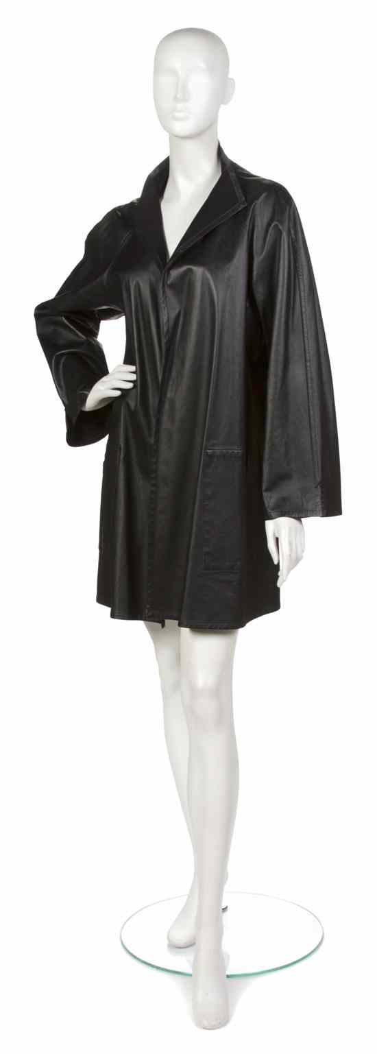 Appraisal: A Pauline Trigere Black Leather Coat in a swing style