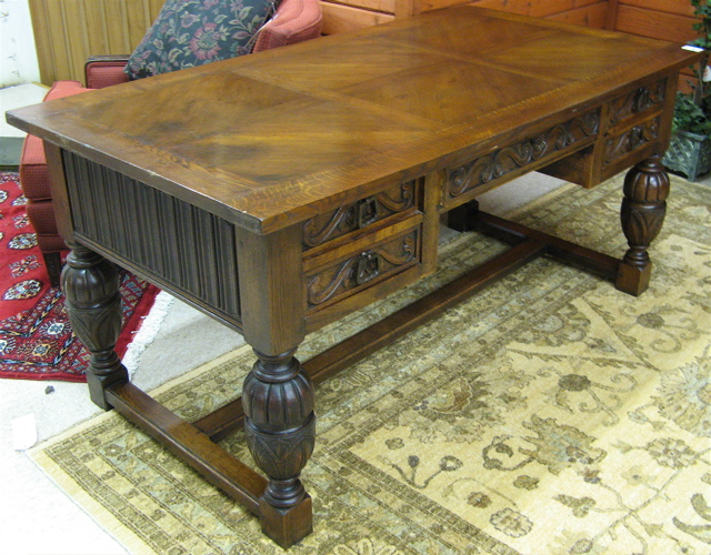 Appraisal: OAK FLAT-TOP DESK Continental early th century having a rectangular