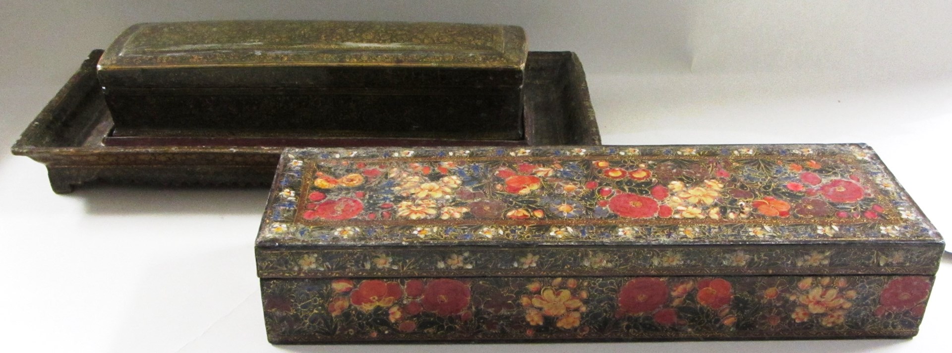 Appraisal: A Kashmiri lacquered papier mache desk set Srinagar Kashmir India