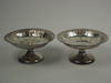 Appraisal: COMPOTES - Matched pair of round pedestal base sterling compotes