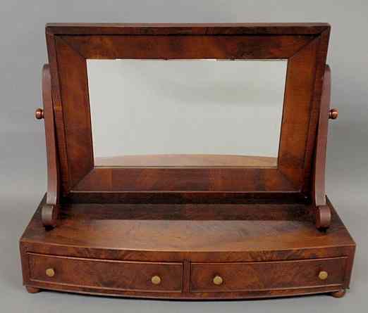 Appraisal: Large Empire mahogany bow-front shaving mirror with two drawers and