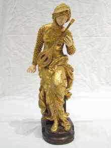 Appraisal: After Louis Carrier Belleuse - a French bronze parcel gilt