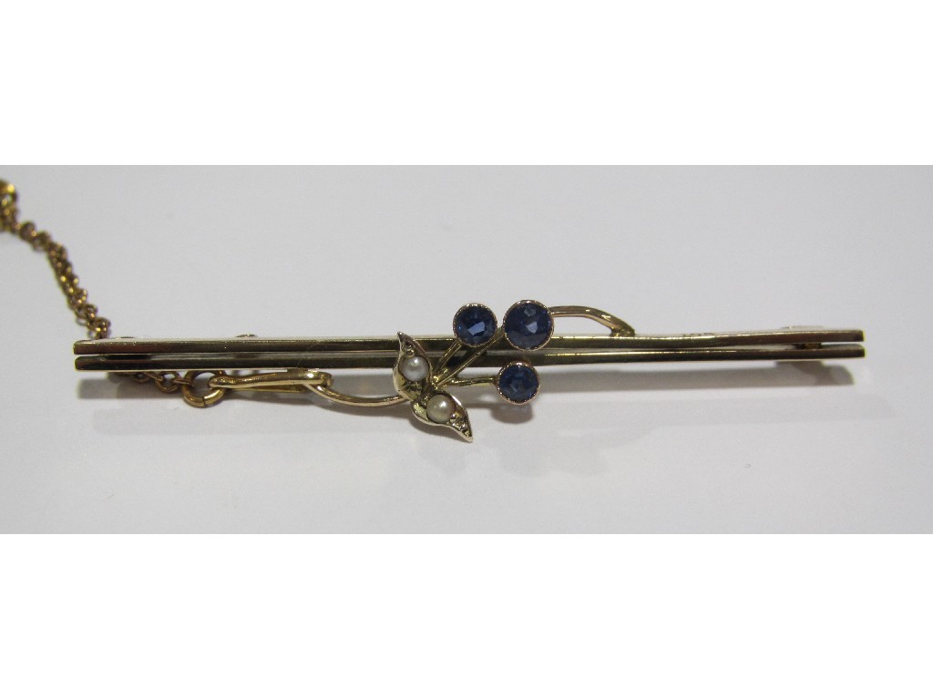 Appraisal: Nine carat gold sapphire and seed pearl set bar brooch