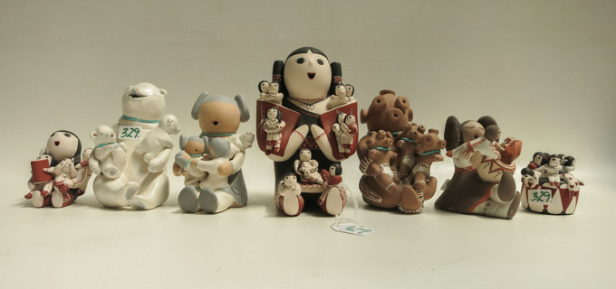 Appraisal: NATIVE AMERICAN FIGURAL GROUP CLAY SCULPTURES seven pieces comprised of