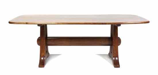 Appraisal: A Contemporary Wood Dining Table having a rectangular top with