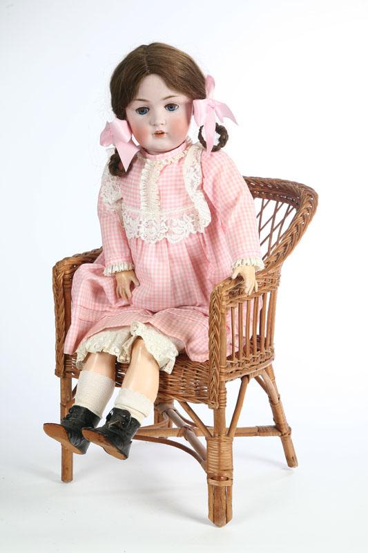 Appraisal: BISQUE HEAD DOLL AND CHAIR A signed JDK bisque head