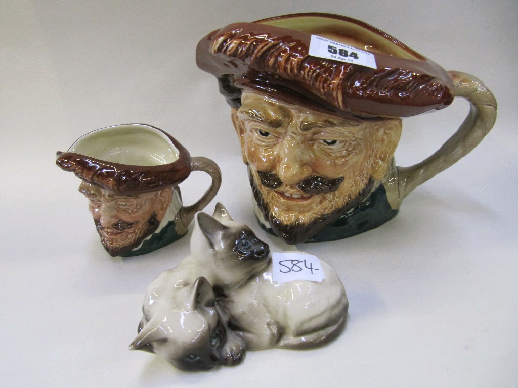 Appraisal: Two Royal Doulton 'Drake' character jugs and a Beswick figure