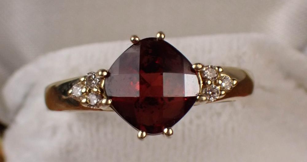 Appraisal: GARNET DIAMOND AND FOURTEEN KARAT GOLD RING with three round