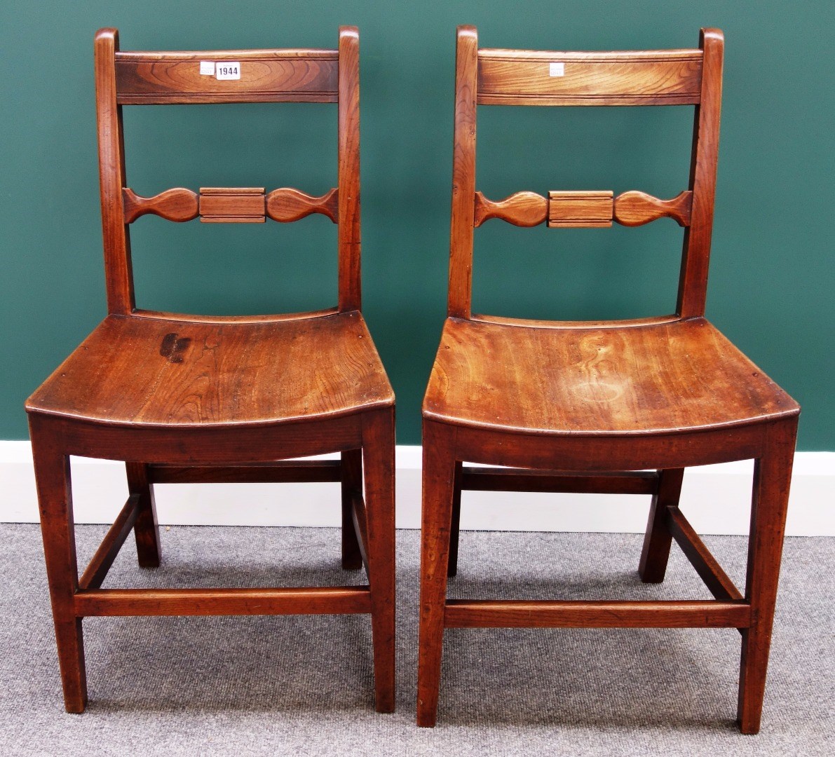 Appraisal: A pair of George III elm dining chairs with tablet