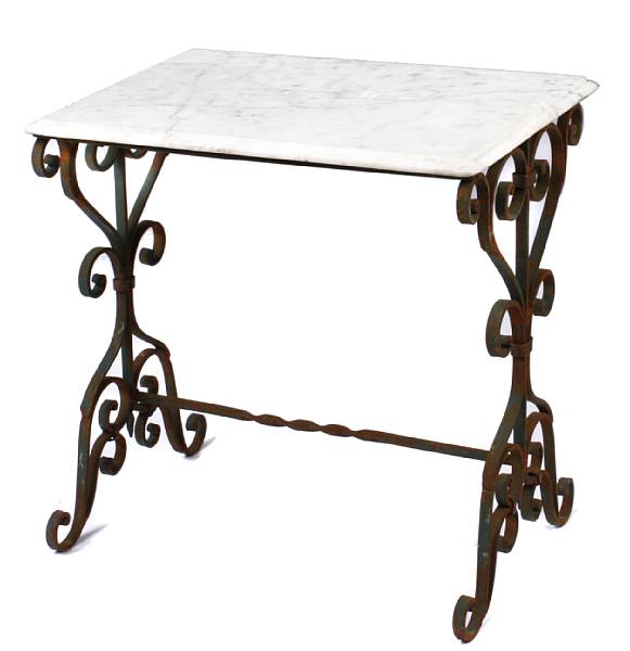 Appraisal: A pair of French style wrought iron marble topped tables