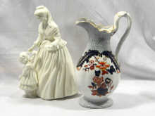 Appraisal: A Royal Worcester porcelain figure of a mother and child