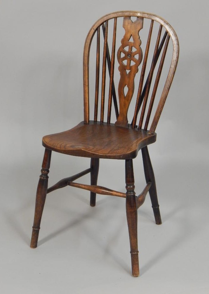 Appraisal: A mid- thC ash and elm Windsor chair with a