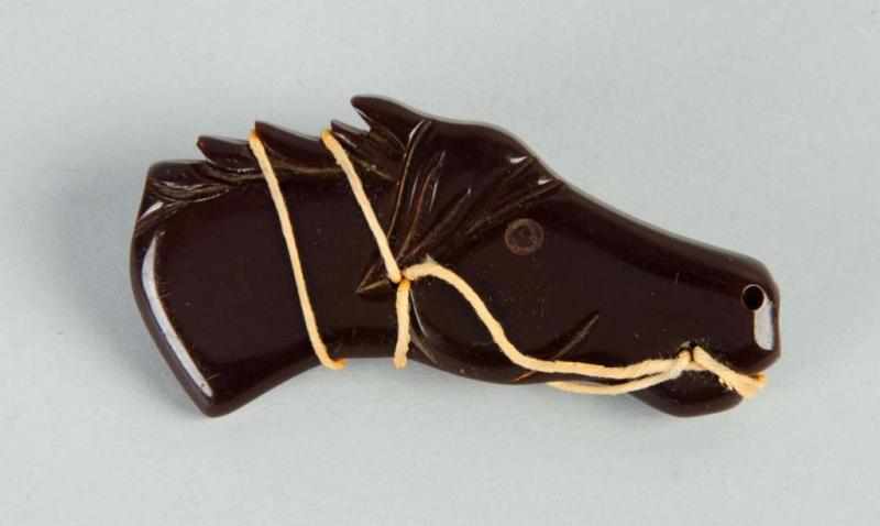 Appraisal: Bakelite Carved Brown Horse Pin Description No damage Condition Excellent