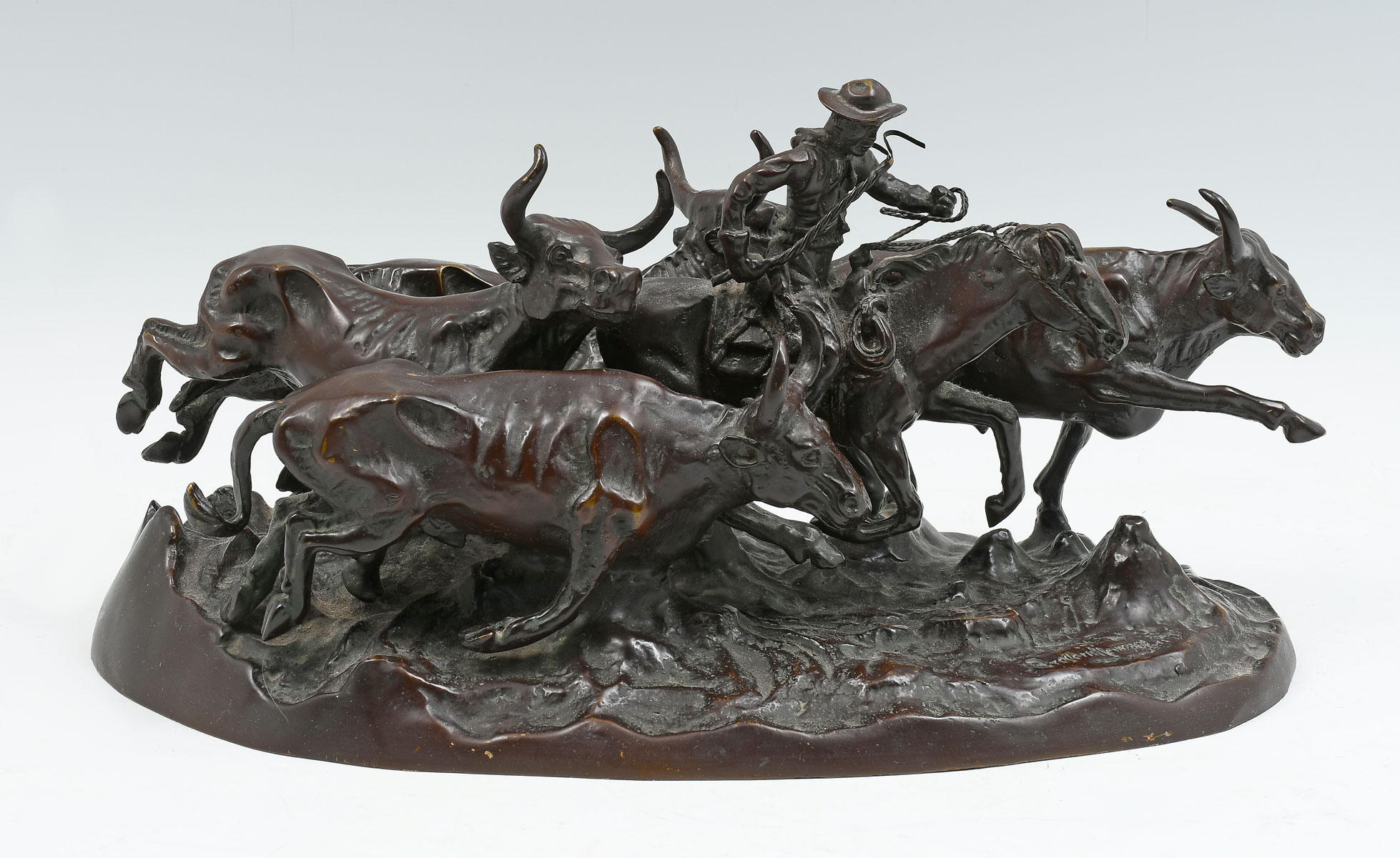 Appraisal: AFTER FREDERIC REMINGTON ''STAMPEDE'' BRONZE Bronze sculpture on marble base