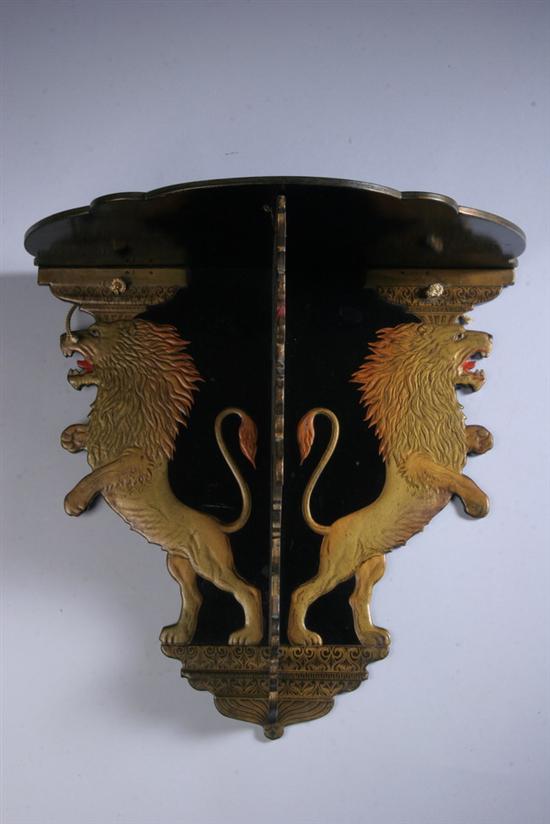 Appraisal: PAINTED AND LACQUERED FIGURAL WALL BRACKET th century Backplate depicting