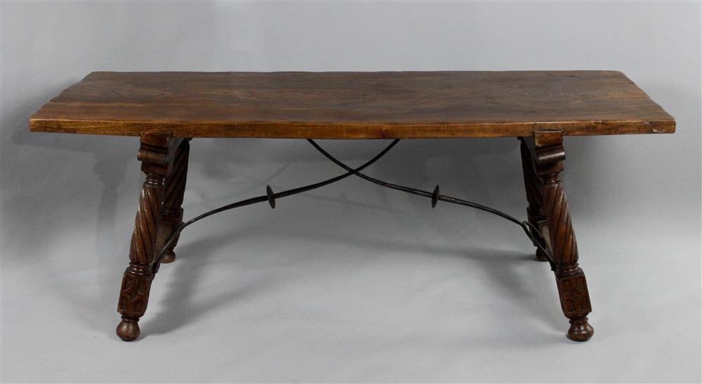 Appraisal: CONTINENTAL BAROQUE STYLE CARVED WALNUT TRESTLE TABLE having a heavy